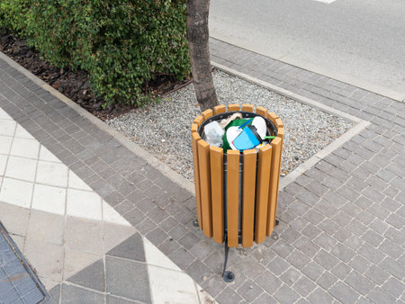 A ordinary trash can on the street