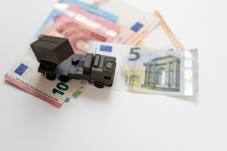 concept four rockets sent upwards against a hundred dollar banknote money background. Weapons of mass destruction, nuclear warhead, chemical charge. armamentの写真素材