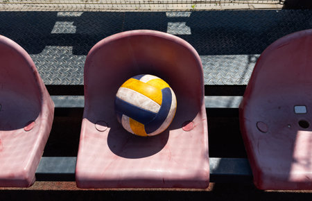 volleyball ball on bench on the sports tribuneの写真素材