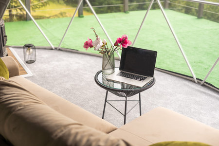 laptop in the dome campingの写真素材