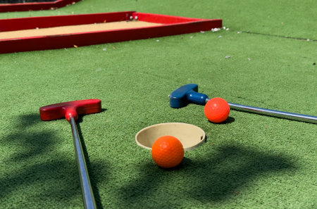 Closeup of player play mini golf with ballの写真素材