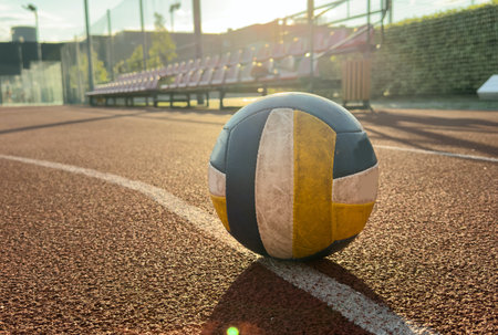 volleyball. blue with yellow color ball on the playground. volleyball cover, red. ball gameの写真素材