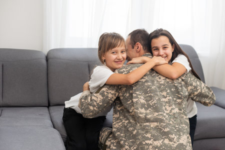 Little girl with her military father at homeの写真素材