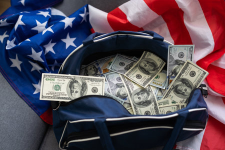 Open suitcase with one million dollars bills stacksの写真素材