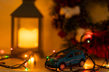toy car with garland in the backgroundの写真素材