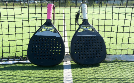 padel tennis racket sport court and balls.の写真素材