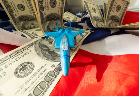 US Air Force Day concept with a retro wooden airplane above the USA flag.の写真素材