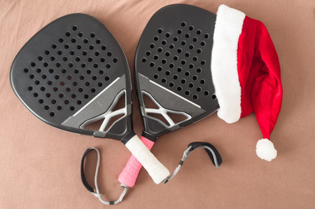 padel tennis racket and Santa hatの写真素材