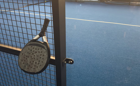 paddle rackets on the playing court