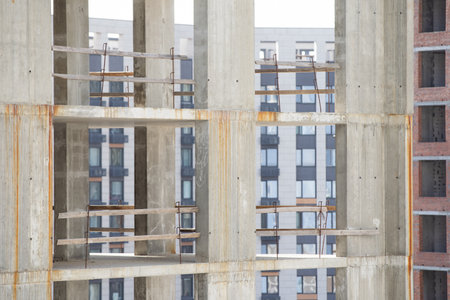 Construction site. Construction of Skyscrapers. Tower Crane on formworks. Construction of Multi Storey Residential Building. Tower Cranes on Residential buildings Construction. Housing built.の写真素材
