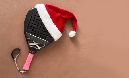 padel racket and santa hatの写真素材
