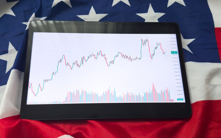 Investors analyze the data stock market index via smartphone screen to trade the stock chart for planning investments take profit, trade stock exchange market and cryptocurrency data, financial.の写真素材
