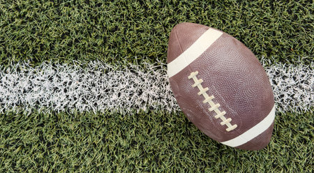 Football at the goal line on a grass field overhead view