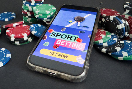 Gambling online casino Internet betting concept green screen. smartphone with poker chips, dice. Jackpot, casino chips.の写真素材