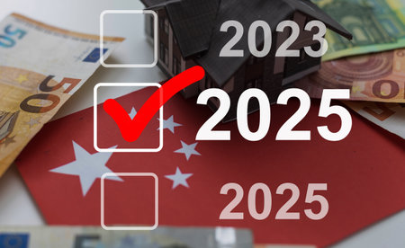 Businessman pointing to digital 2025 on virtual screen. Countdown to 2025 concept. Space for text.の写真素材