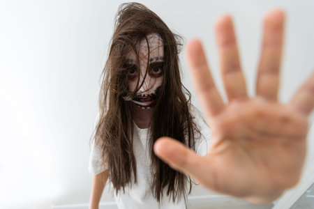 scary girl in white dress from horror film