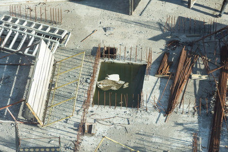 Concrete drainage pipes at the construction site. Laying of underground storm sewer pipes....