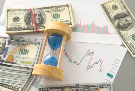 Businessman managing projects and organizing time in critical situations from economic crisis using data analysis report to increase productivity and achieve business goal. Effective time management.の写真素材