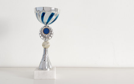 a silver trophy cup isolated on white with clipping pathの写真素材