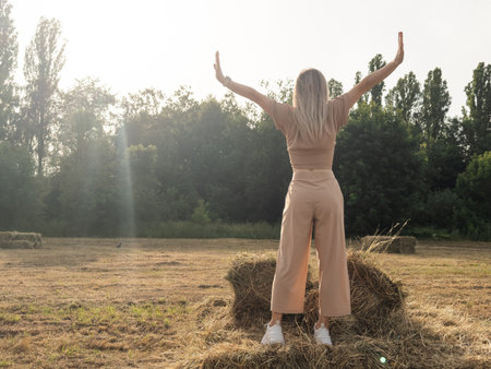 happy girl in a suit looks to the side.の写真素材