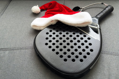 padel racket and santa hatの写真素材