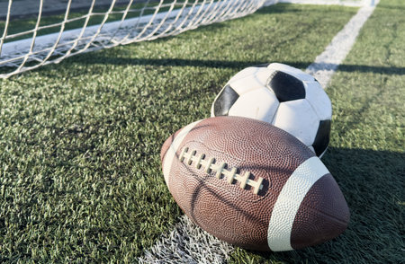 soccer ball and rugby ball
