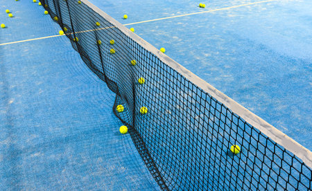 blue paddle tennis court net close upの写真素材