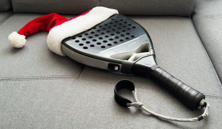 padel racket and santa hatの写真素材