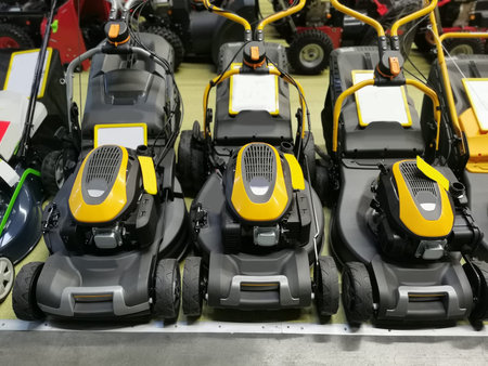 Lawn mowers are sold in the shop. Garden equipment in stock in the store.