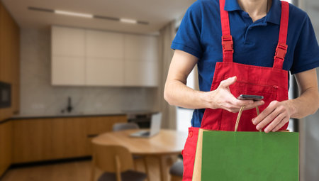 Courier holding paper bags with food, space for text. Delivery service