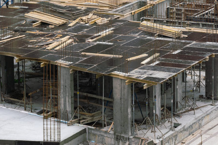 Construction workers working on Construction machine. Aerial platform for workers who work at height...