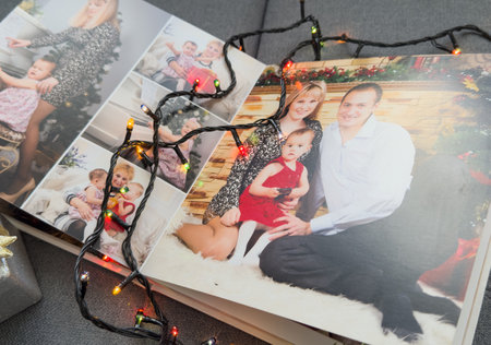 a Photobook of family. Photobook is gift. photo album next to giftsの写真素材