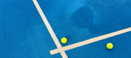 blue paddle tennis court net close upの写真素材