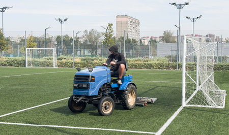 soccer field and worker in field