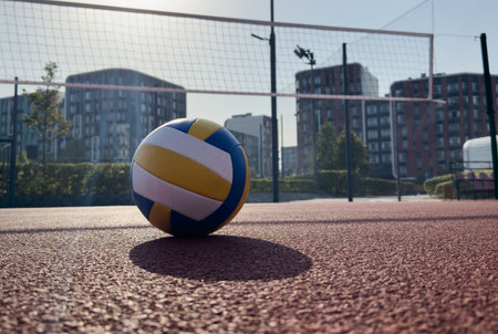 volleyball. blue with yellow color ball on the playground. volleyball cover, red. ball gameの写真素材