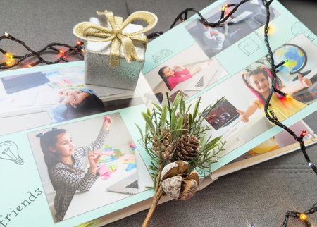 photobooks near the New Year tree, colored as a gift for the holiday.の写真素材