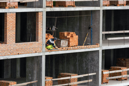 Construction of apartment buildings, dense urban development. The process of construction of...