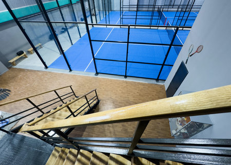 Padel court with lines and net indoor