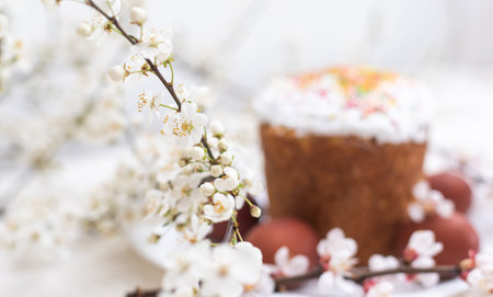 Easter cake and colored eggs. Traditional Easter baking. Easter holiday. Close-up.