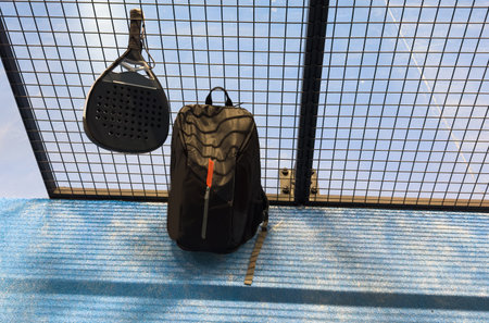 paddle racket and bag on the courtの写真素材