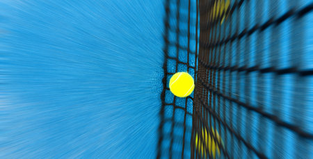 balls near the net of a blue paddle tennis court, sports courtsの写真素材