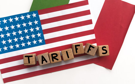 Flags of USA and Mexico and barrier with stop sign at the borderの写真素材