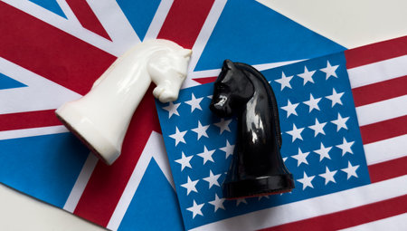 Two knights standing on American flag and UK flag.の写真素材