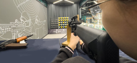 Shooters practicing tactical shooting in a modern indoor gun range.