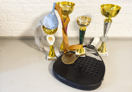 many sports awards and a paddle racketの写真素材
