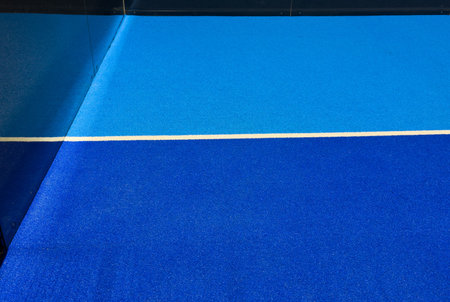 blue paddle tennis artificial grass courtの写真素材