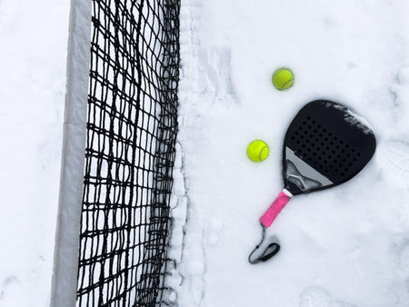 winter padel tennis court full of snowの写真素材