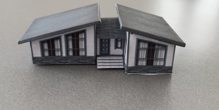 classic house model on wooden backgroundの写真素材