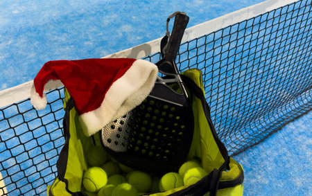 Open Padel Tournament. Poster for social networks for New Years games. Padel tennis racket on tournament. paddle racket on courtの写真素材