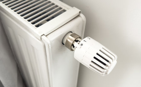 White heating battery and electronic, smart temperature regulator. warmth in the room and the house. preparation for spring and winter. energy savingの写真素材